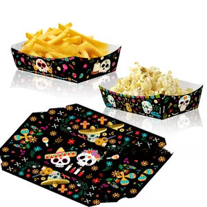 Close-up of Mexican Day of the Dead sugar skull pattern paper trays for party snacks