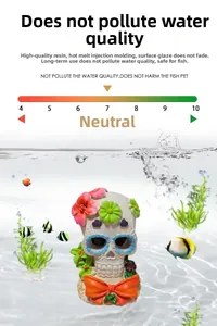 Decorative skull fish tank ornament with colorful flowers and bow for aquarium landscaping