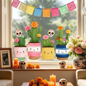 Detailed view of Mexican Day of the Dead cactus window stickers on bright window glass