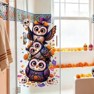 Cute Day of the Dead owls static cling window sticker on a transparent glass bathroom door