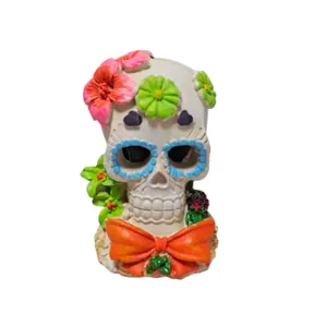 Sugar skull aquarium ornament with colorful flowers and orange bow for fish tank decoration