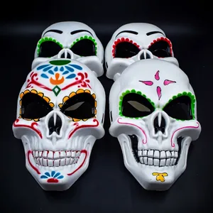 Detailed set of four colorful Mexican Day of the Dead sugar skull masks for Halloween party
