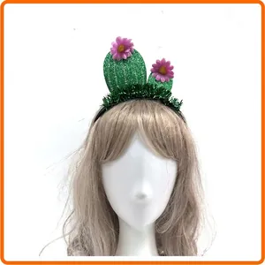 Detail view of a glittery cactus headband with pink flowers on a mannequin display head