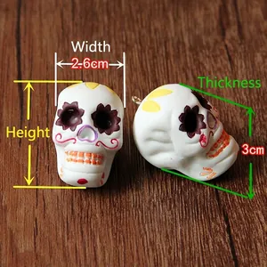 Detailed view of a colorful resin sugar skull pendant with height, width, and thickness labels.