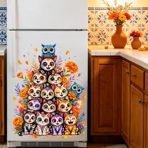 Detail of Day of the Dead themed cute cat and owl static stickers on a kitchen refrigerator