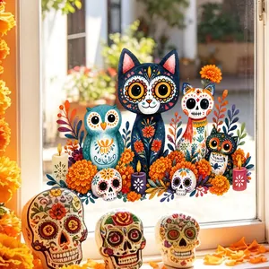 Day of the Dead window stickers with colorful cat and owl motifs on a clear glass pane