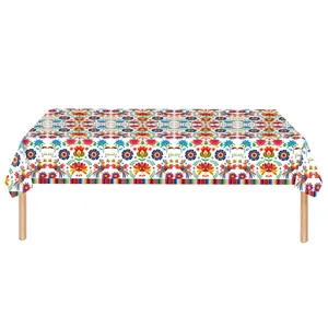Vibrant Mexican Fiesta tablecloth featuring traditional floral patterns and festive bird motifs.