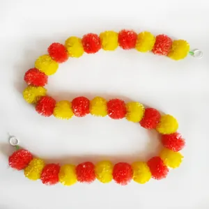 Handmade orange and yellow marigold garland for Indian Diwali and Day of the Dead