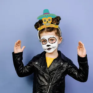 Detail of Day of the Dead skull headband worn by a child for Halloween party