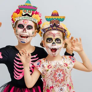 Close-up of children wearing Day of the Dead headbands with sugar skull and sombrero