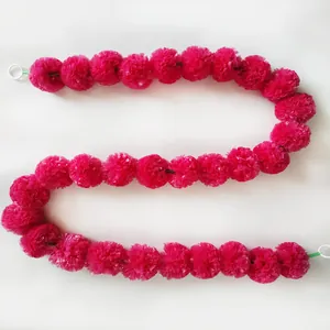 Vibrant pink plastic marigold garland string for festive wedding decoration and events