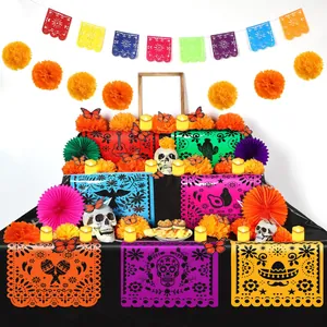 Vibrant Mexican Day of the Dead decoration set with marigolds and felt banners