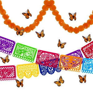 Detailed view of Mexican Day of the Dead decoration set with marigold garlands and banners.