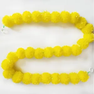 Vibrant yellow marigold flower garland for Indian weddings and festive decorations