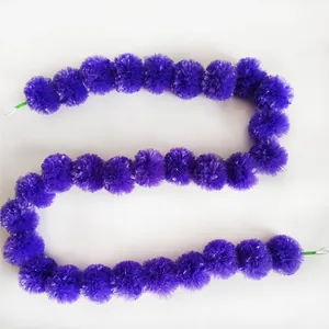 Decorative purple marigold flower garland for Indian weddings and Mexican festival decor
