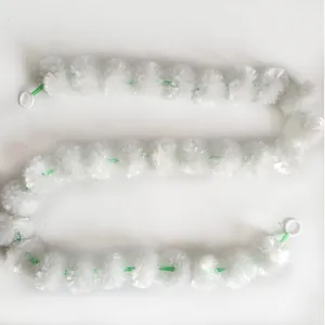 White plastic marigold garland with green stem for wedding and festival decoration