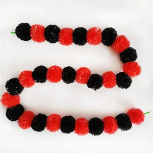 Handmade black and red marigold flower garland for Day of the Dead and wedding decor