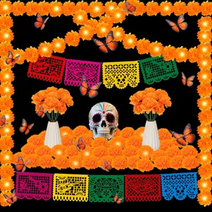 Complete Day of the Dead decoration set featuring marigold garlands, sugar skull, and banners