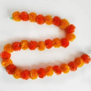 Vibrant orange and yellow plastic marigold flower garland for Indian wedding decorations
