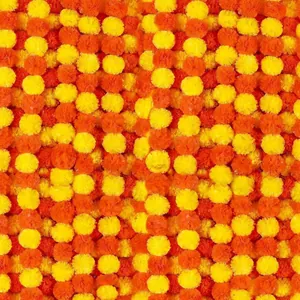 Close-up detail of vibrant orange and yellow marigold flower garlands for festive decor