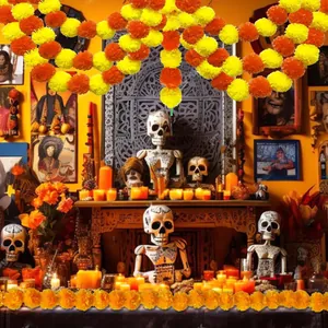 Vibrant orange and yellow marigold garlands used as Day of the Dead altar decorations.