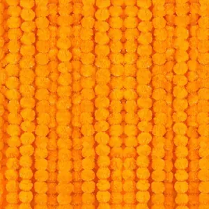 Vibrant orange marigold flower garlands for Day of the Dead and festive holiday decorations