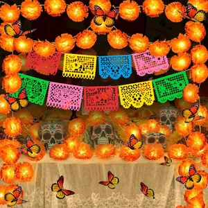 Festive Day of the Dead set featuring marigold garlands, colorful banners, and butterflies