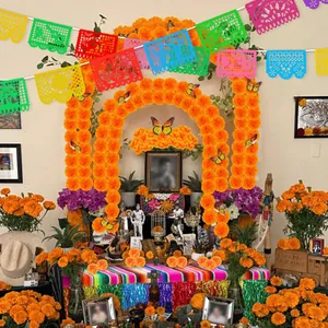 Dia de los Muertos Mexican decoration set with orange marigold garlands and banners