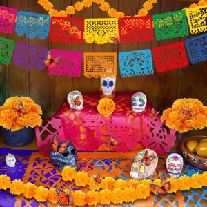 Day of the Dead decoration kit with colorful Papel Picado banners and marigolds