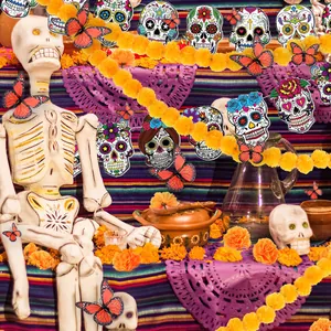 Day of the Dead decoration set with marigold garlands, butterflies and sugar skulls