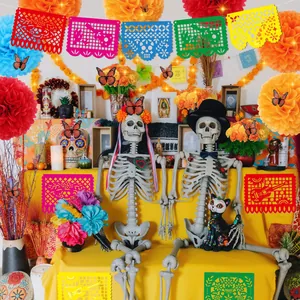 Vibrant Mexican Day of the Dead decoration set with marigold garlands and banners