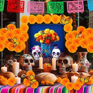 Traditional Day of the Dead decoration set with marigold garlands, butterflies and banners