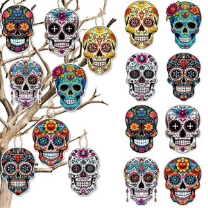 Colorful wooden sugar skull ornaments for Day of the Dead party decorations.