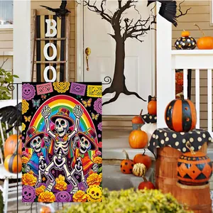 Festive Day of the Dead garden flag with colorful dancing skeletons on a porch.