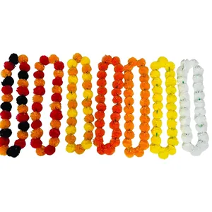 Various colored marigold garlands for Day of the Dead and Halloween party decoration