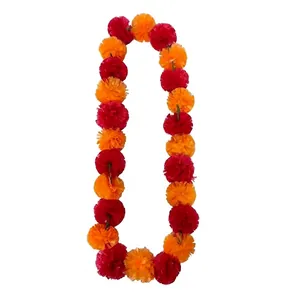 Close-up of vibrant orange and red artificial marigold garland for festival decor