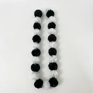 Black and white marigold flower garland for festive home decoration