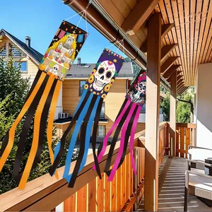 Set of 3 Day of the Dead windsocks with skull and altar designs for outdoor party decor