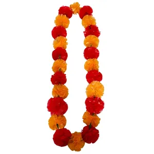 Detailed view of vibrant orange and red marigold flower garland for Day of the Dead decor