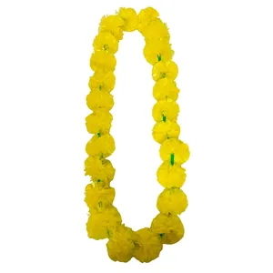 Detail view of a bright yellow marigold lei for Day of the Dead festive decor
