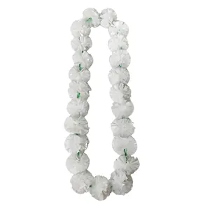 White plastic marigold floral garland for wedding or Day of the Dead decor.