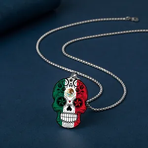 Detailed close-up of a Mexican flag skull pendant necklace made of durable stainless steel.