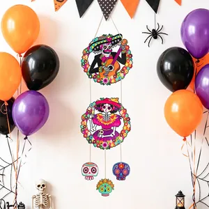 Vibrant Day of the Dead hanging decor featuring skeleton characters in party setting