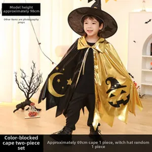 Detailed view of the kids Halloween wizard cape and hat set with gold pumpkin prints