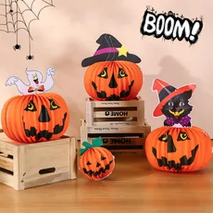 Set of Halloween honeycomb paper pumpkins with ghost and witch cat toppers.