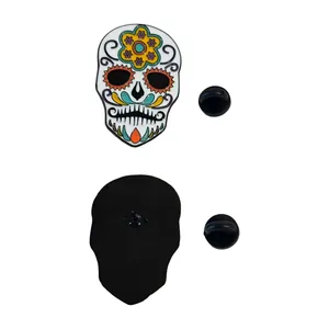 Mexican sugar skull enamel pin with colorful floral design for Day of the Dead celebration