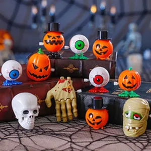 Assorted Halloween wind-up toys featuring skull, pumpkin, and eyeball figurines