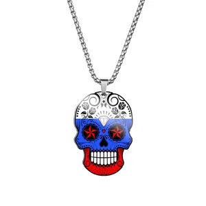 Detailed view of stainless steel sugar skull necklace with Russian flag colors