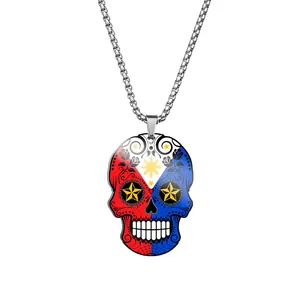 Close-up of stainless steel necklace with Philippines flag theme sugar skull pendant.