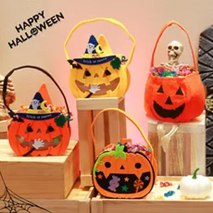 Halloween pumpkin felt gift bags with skeleton decorations for home festive layout